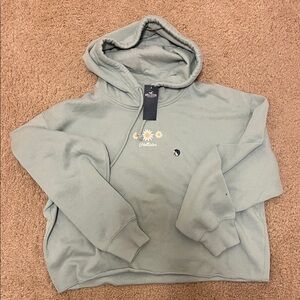 Hollister Women’s Green Hoodie with Floral Design NWT